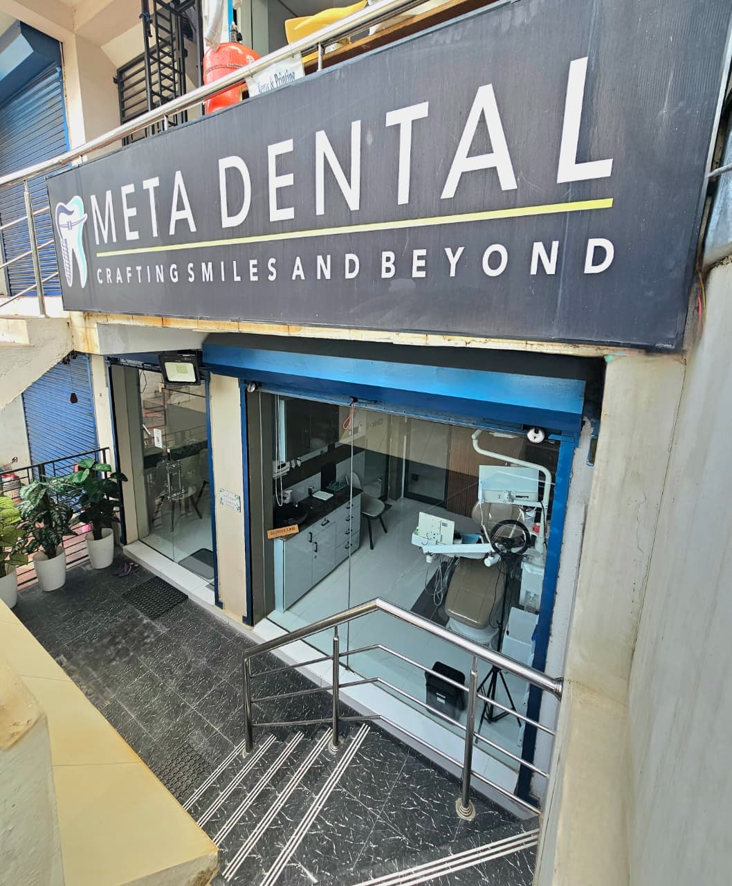 META DENTAL signboard and glass entrance in Panaiyur