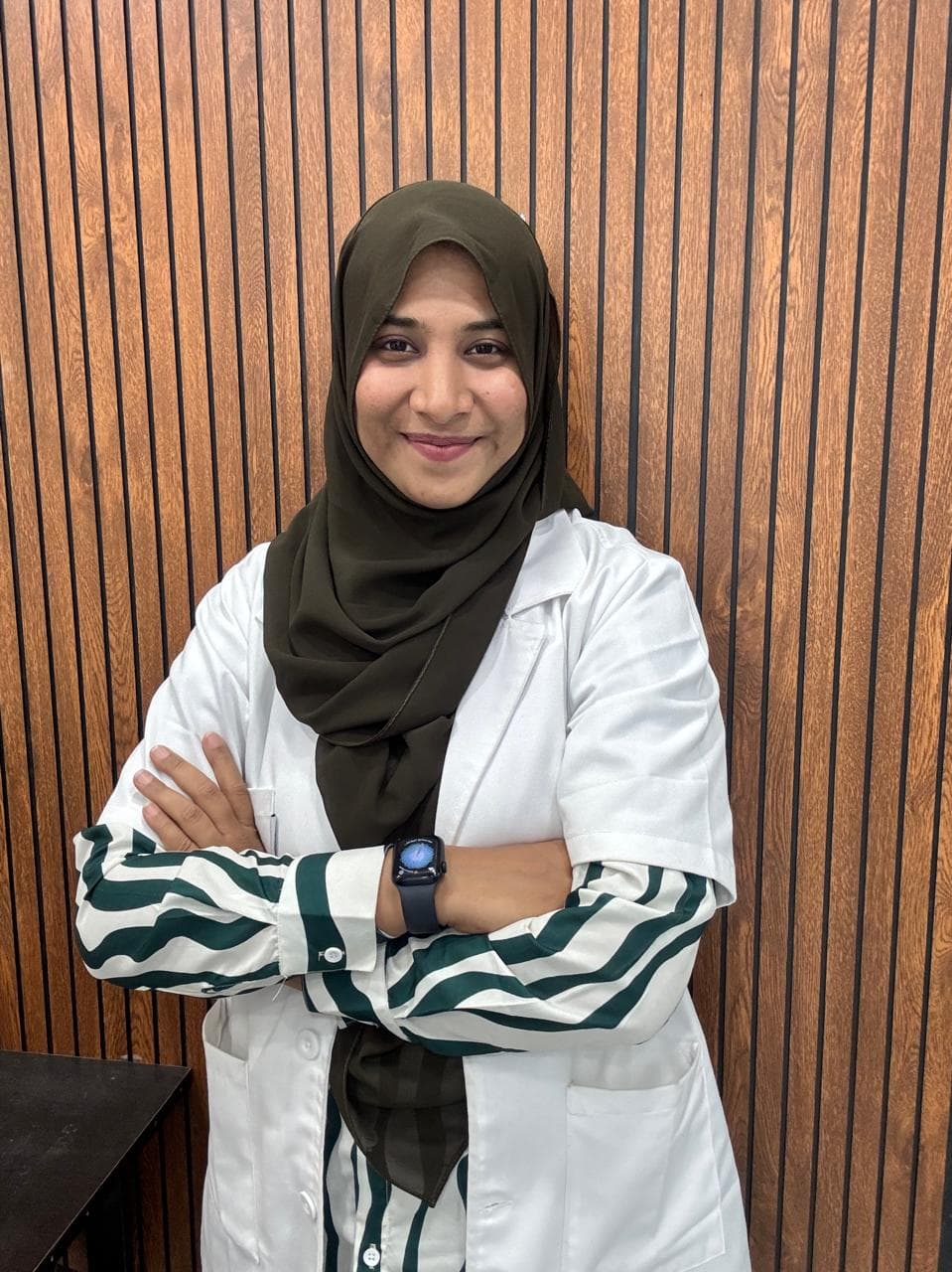META DENTAL dentist in a white coat at the clinic